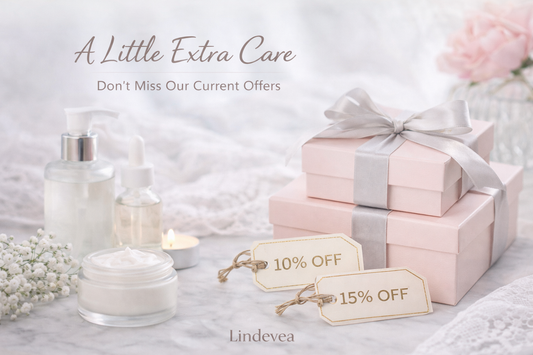 Lindevea skincare products displayed on a marble surface with soft lighting and discount tags showing 10% and 15% off, promoting current special offers.